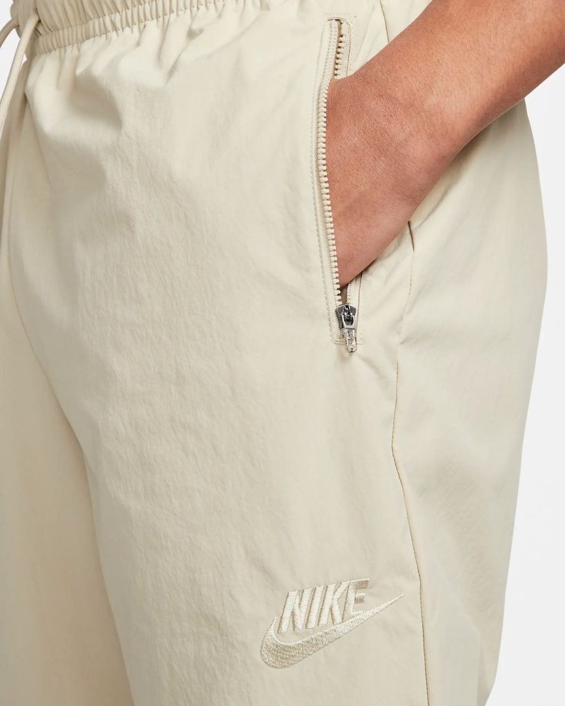 pantaloni nike uomo lunghi tessuto beige